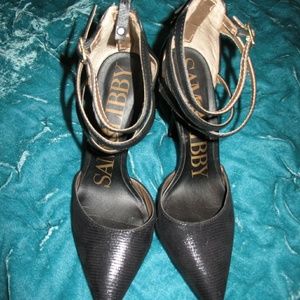 Sexy, strappy black heels.